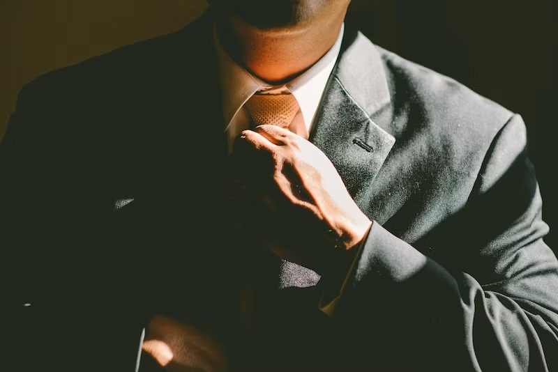 professional photoshoot of a man in a suite